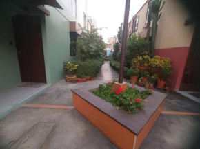 Duplex rodeado de jardines